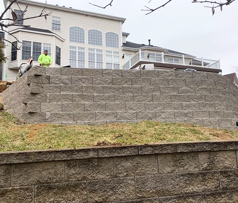 hillside stabilization with retaining wall system protecting home in Cincinnati Ohio