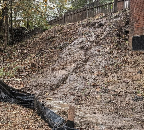 mud sliding down hillside after rain showing unstable soil conditions in Cincinnati Ohio