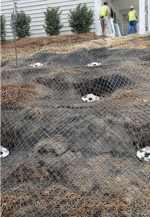 geogrid reinforced soil system installed on hillside for stabilization in Cincinnati Ohio