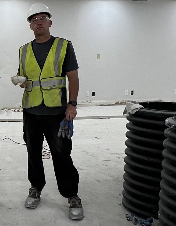 foundation repair and drainage system installation with excavation and waterproofing work